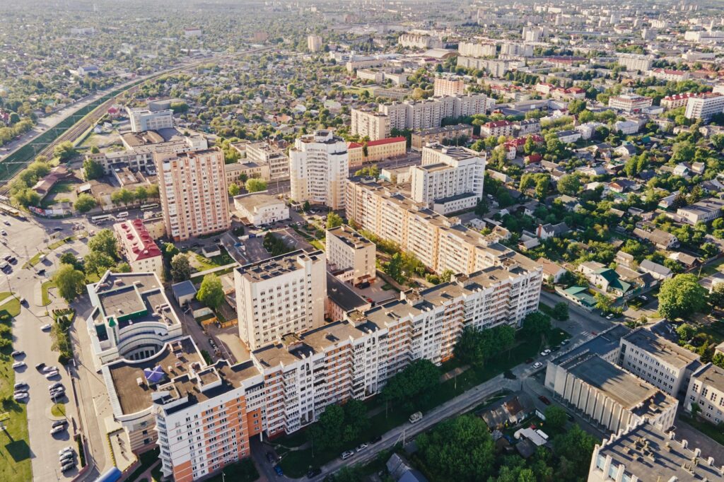 Aerial view of city residential district at sunset