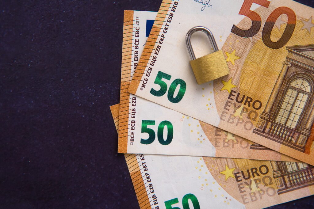 Economic recession, reduced consumption. Locked savings concept.