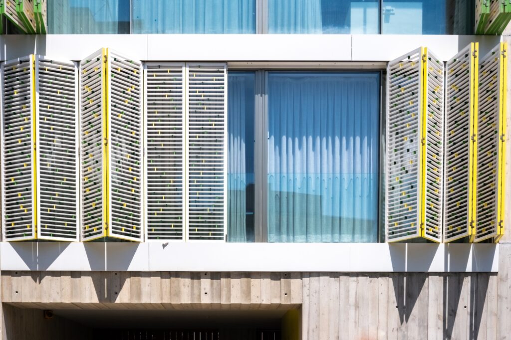 Modern sliding blinds decorated with colors to protect the interior of houses from heat and sun